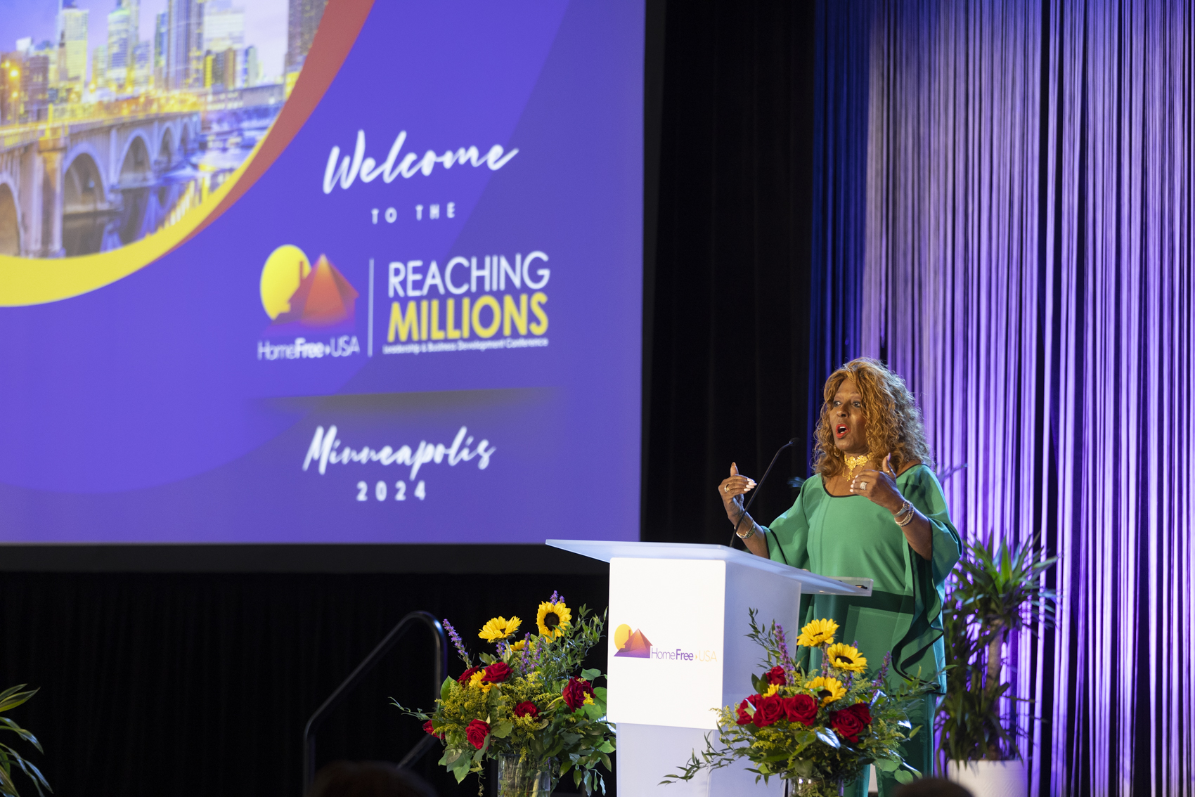 Marcia Griffin delivering a keynote at the Reaching Millions conference